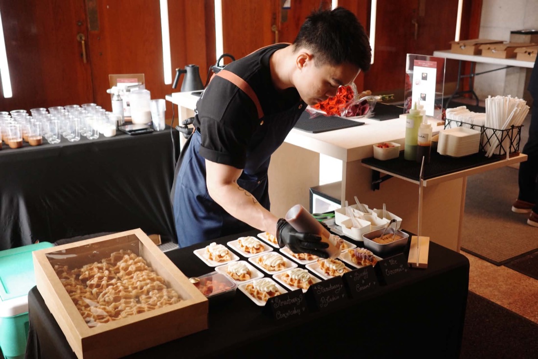 GIOT staff setting up the catering cart